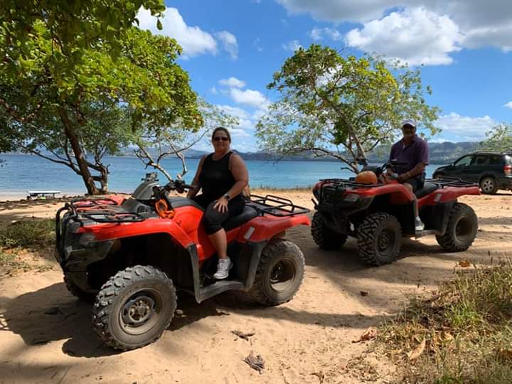 Our client has a good time on the ATV Beach Tour around Playa Conchal, Costa Rica.