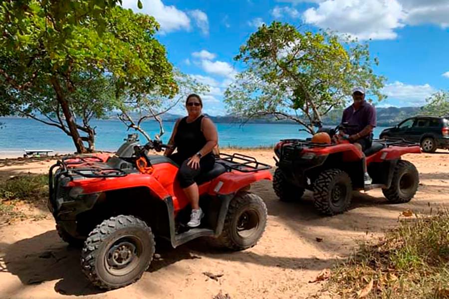 Our client has a good time on the ATV Beach Tour around Playa Conchal, Costa Rica.
