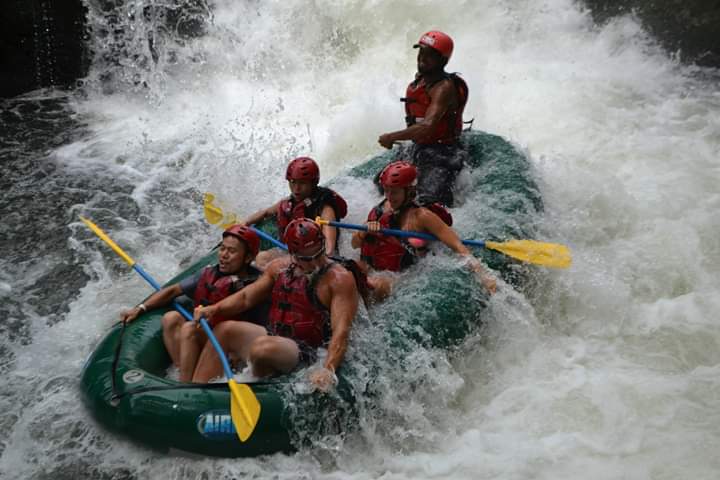 A family having a good time with our whitewater rafting