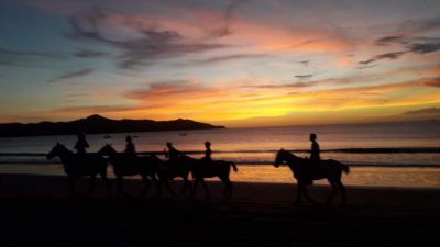 Brasilito horses back sunset by Conchal Adventures Costa Rica