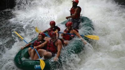 A family having a good time with our whitewater rafting